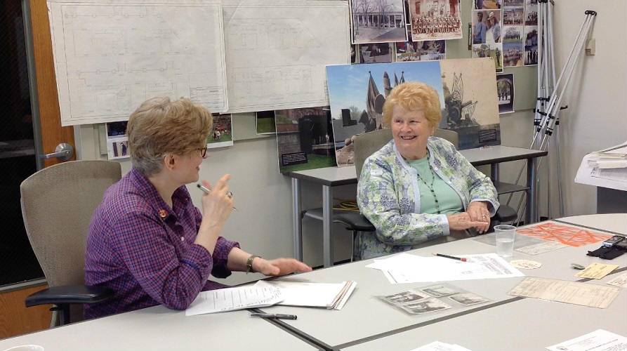 A face-to-face oral-history interview for the U.S. National Park Service, with an interview guide, photographs, and notes on the table
